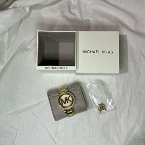 Michael Kors gold watch with rhinestones. 
Never worn !! 🤩